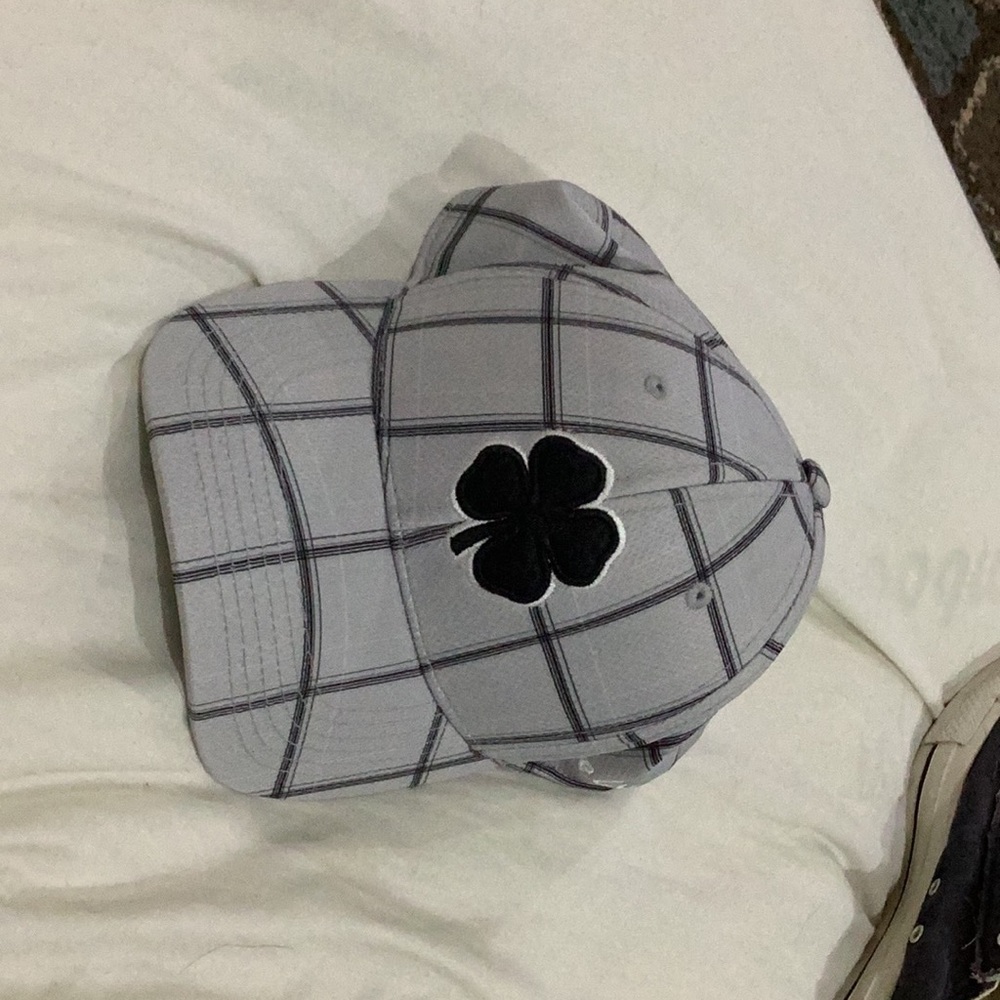 Black clover baseball hat. In great condition